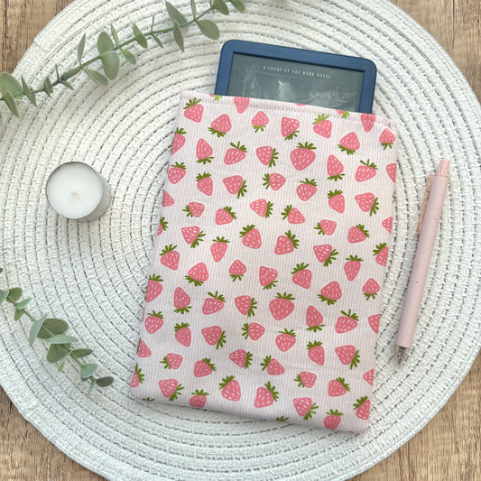 strawberry e-reader sleeve on mat